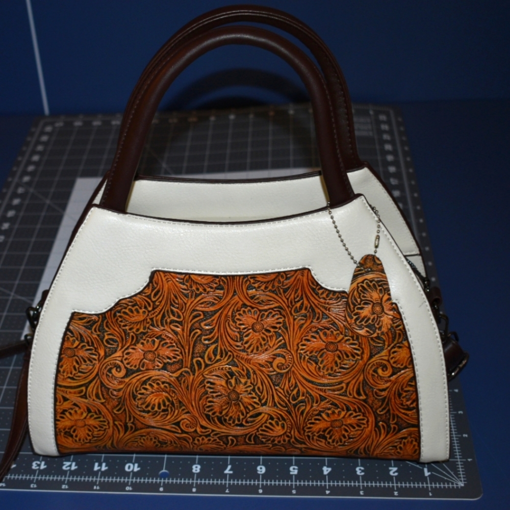 White and Brown Scroll Handbad
